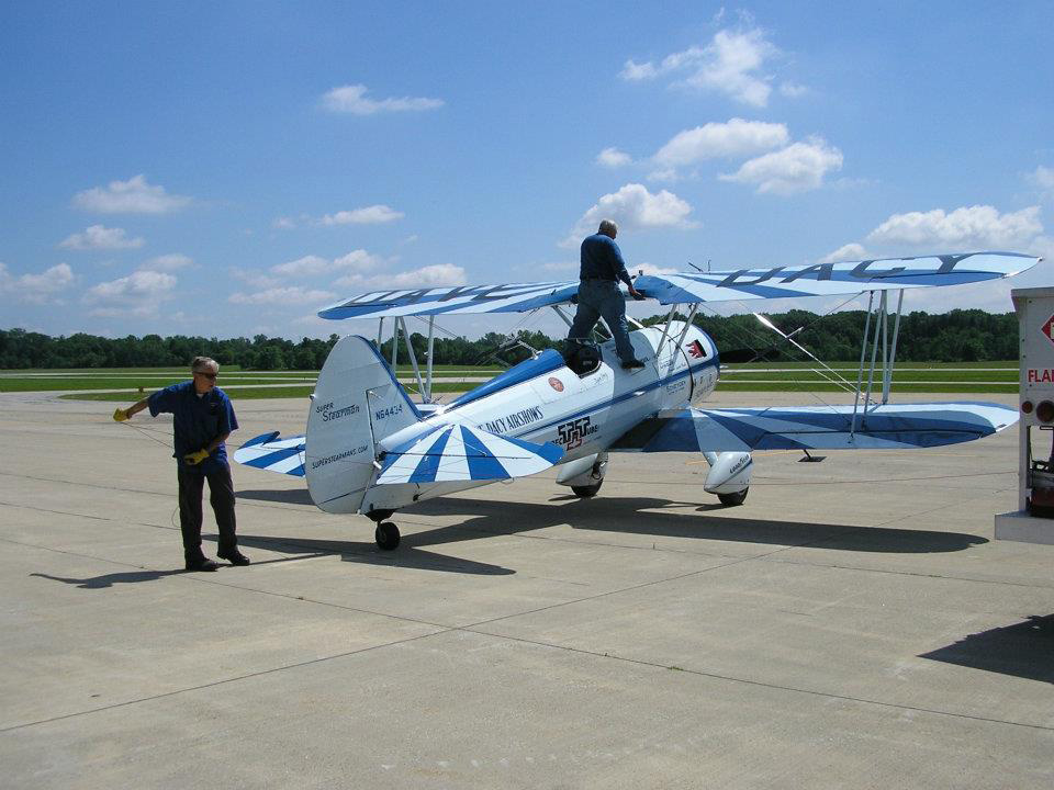 Vintage aircraft being serviced on the ramp at Michigan City Municipal Airport