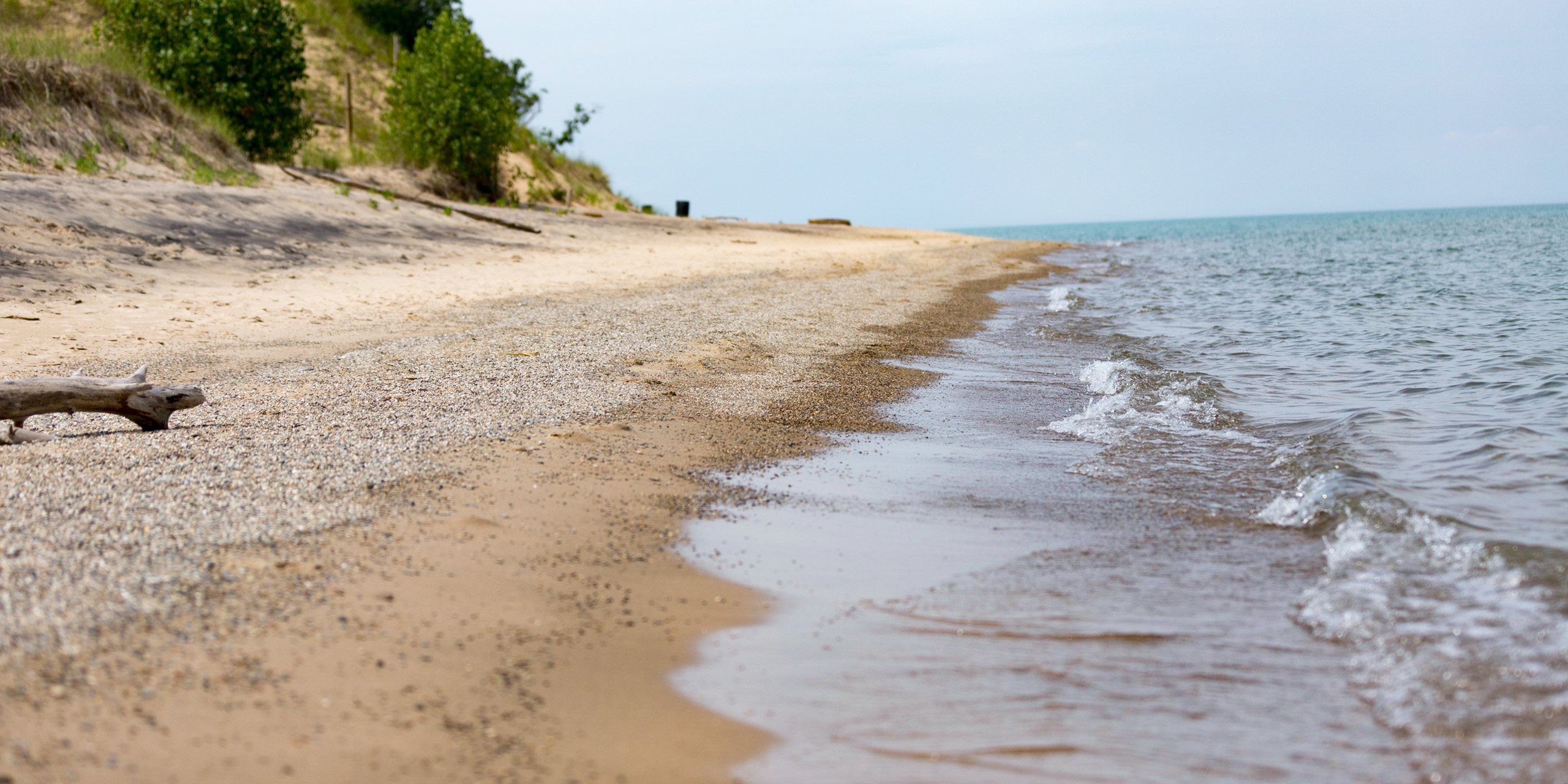 Lake Michigan shoreline and beach in Michigan City, Indiana Lake Michigan shoreline and beach in Michigan City, Indiana