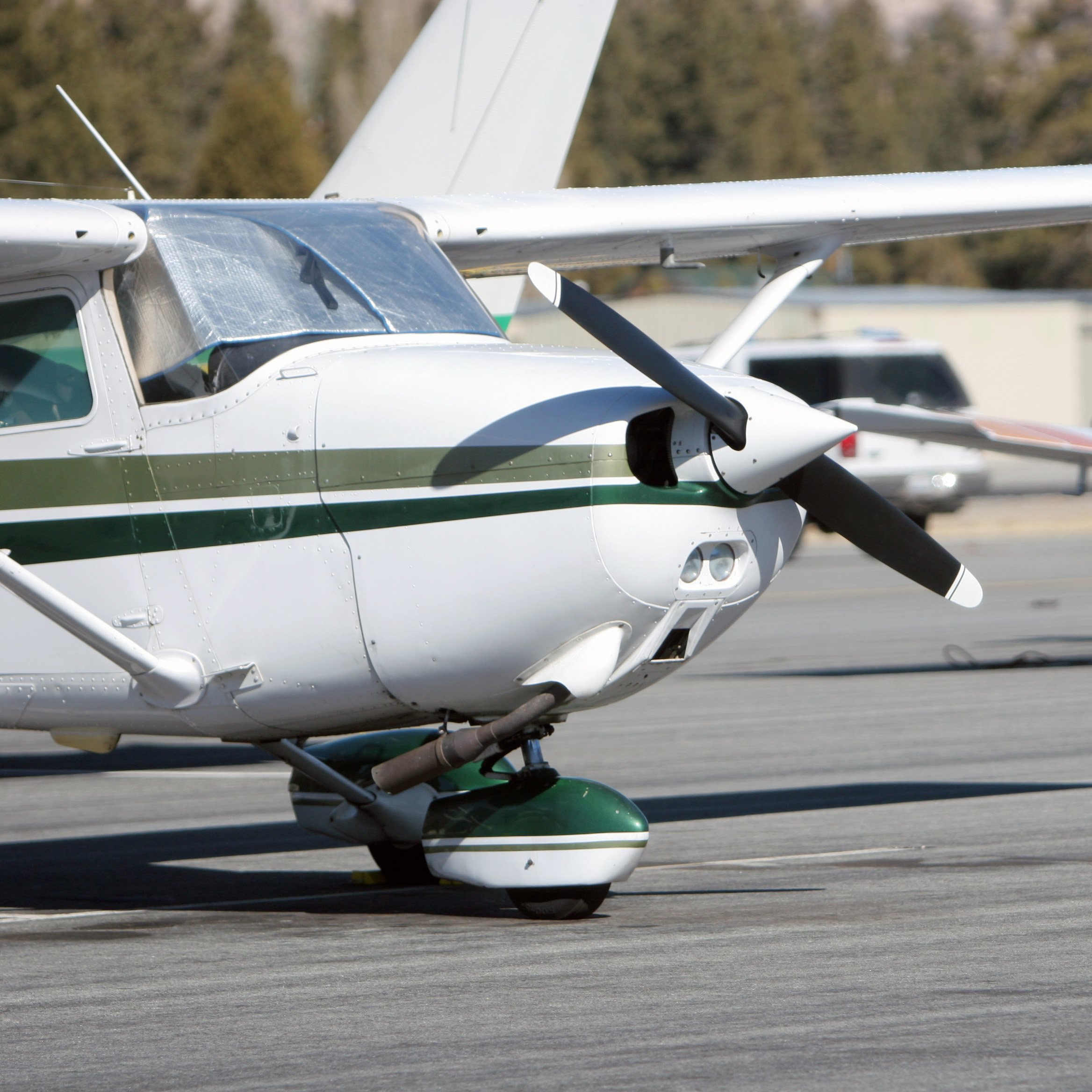 Single-engine aircraft parked on the ramp at Michigan City Municipal Airport Single-engine aircraft parked on the ramp at Michigan City Municipal Airport